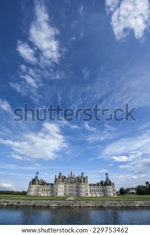 Chateau de Chambord, royal medieval french castle and reflection. Loire Valley, France, Europe. Unesco heritage site. Long exposure.