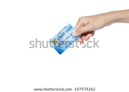 credit card holded by hand over blue background.
