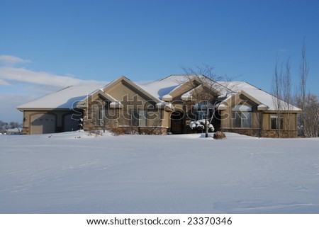 Luxury Home in the Winter after a Snow Storm