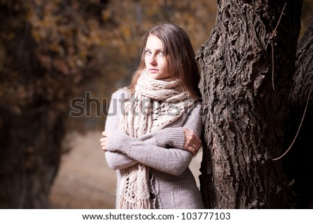 Autumn portrait of beautiful young girls in the woods