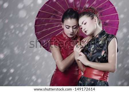 Two geisha in studio