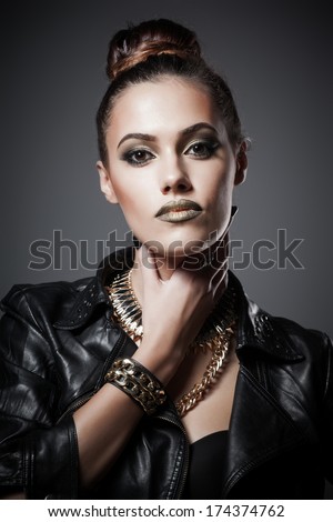 Gorgeous beautiful sexy woman in a leather clothes