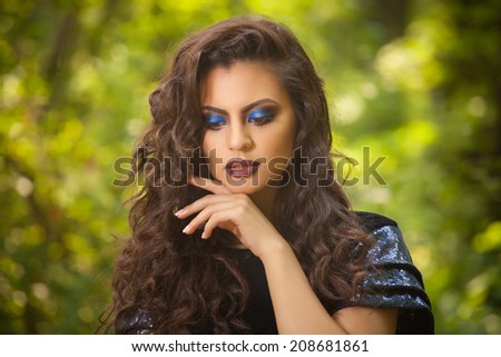 beautiful indian woman with  fashion blue make-up