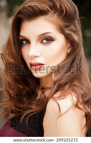 beautiful portrait of a fashion lady  outdoor, close-up shoot