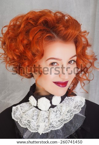 Red hair. Beautiful vintage portrait of Woman with Short curly Hair