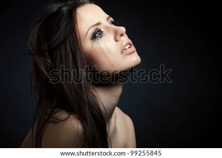 Crying young girl isolated