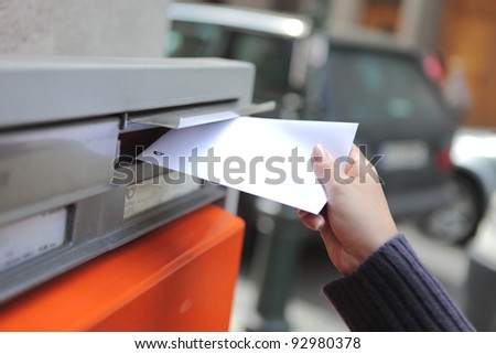 girl posting a letter