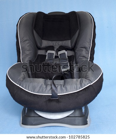 A child\'s car seat isolated on the clean  background