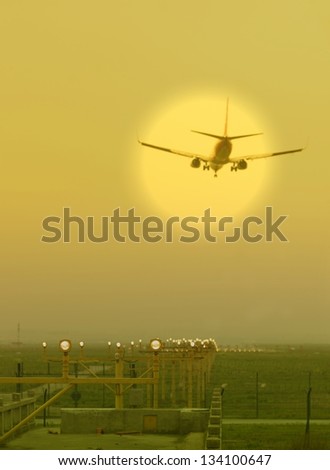 Airplane flying at airport in the sunset,shanghai,China