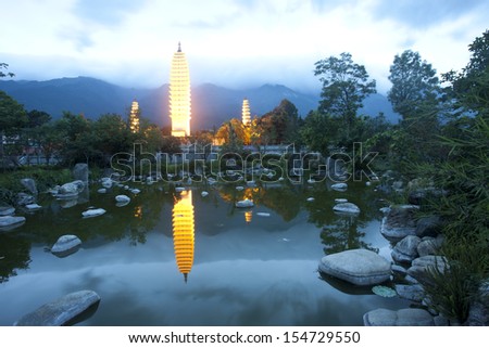 Dali three white pagodas and Cangshan Mountain in the night,dali,yunnan