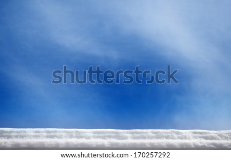 snow roof edge with blue sky,material for designer