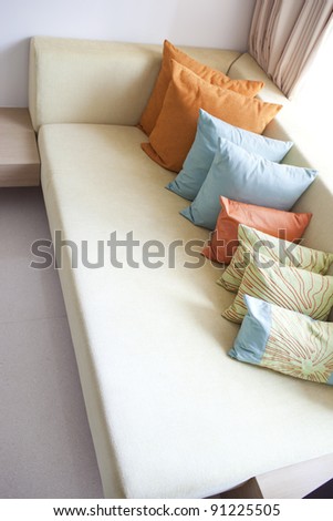 Hold pillow  on the long sofa in Phuket hotel,Thailand
