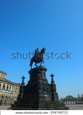 Dresden, Germany - April 23, 2015: King Johann sculpture in the square with a pedestal