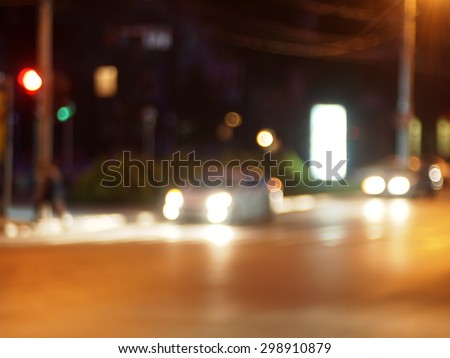 Defocused car, the lights from the headlights and tail lights of cars on the road was blurred for use as a background