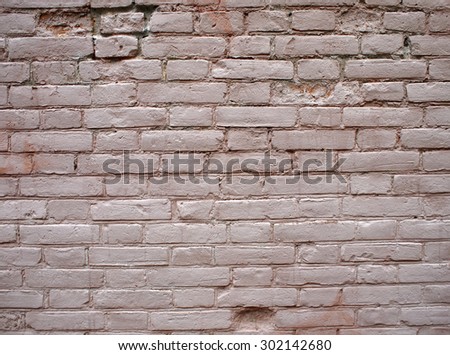 Detail of a wall of the old beige clay bricks for use as background