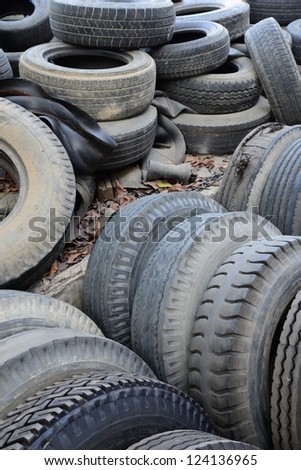 A waste heap of old tyres for rubber recycling