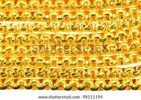 Gold chain isolated on white, closeup