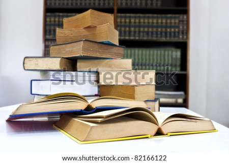 Pile of books in library with clipping path