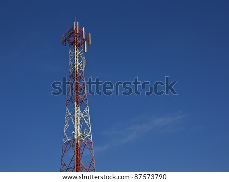 Mobile phone signal post on blue sky background