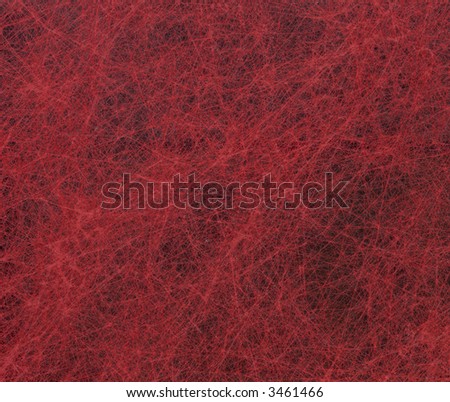 Messy Red threads that form a red textured background