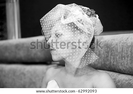 Portrait of wonderful girl  with a bridal veil blackly - white