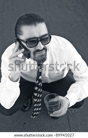A young handsome business man on phone