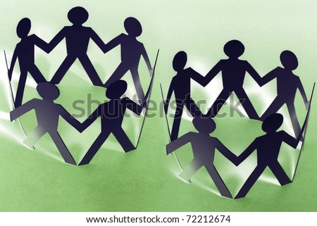 Paper Dolls on Green Background