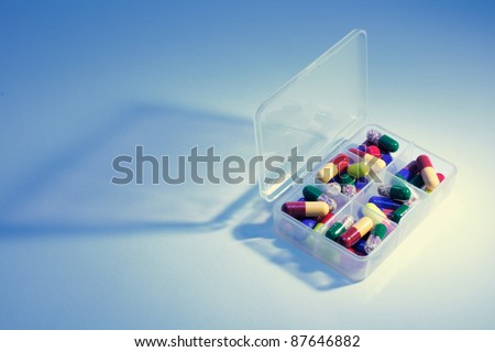 Pills in Pill Box in Blue Cast