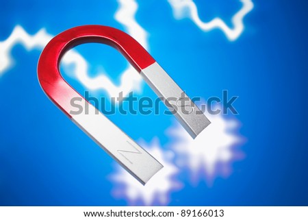 Horseshoe Magnet on Blue Background