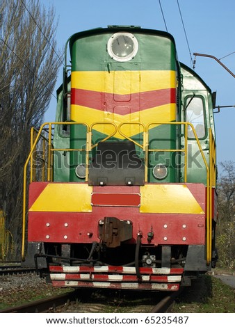The locomotive on the rails.