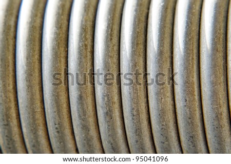 Spring Coil Metal Taken Closeup as Abstract Background.