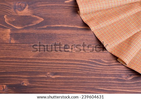 napkin in the upper right corner on the left a brown board with space for text