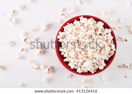 popcorn in a red bowl top view