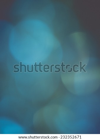 Abstract Festive background. Christmas and New Year feast bokeh background with copyspace. Holiday party background with blurry boke special magic effect.. Vintage effect.