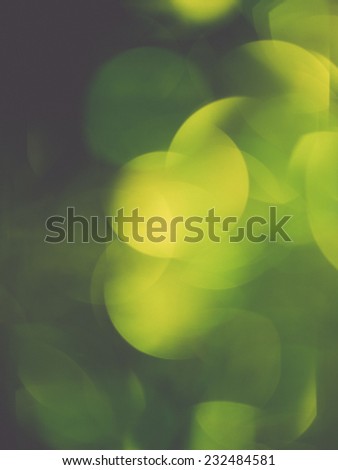 Abstract Festive background. Christmas and New Year feast bokeh background with copyspace. Holiday party background with blurry boke special magic effect.. Vintage photography effect.