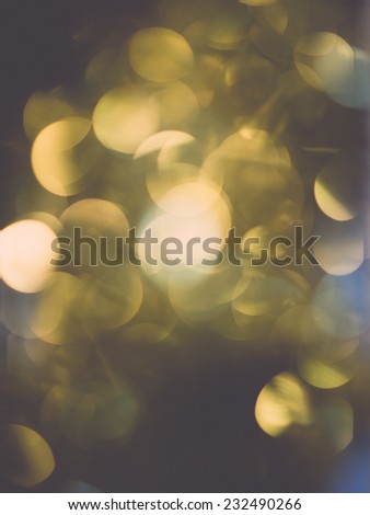 Abstract Festive background. Christmas and New Year feast bokeh background with copyspace. Holiday party background with blurry boke special magic effect.. Vintage photography effect.