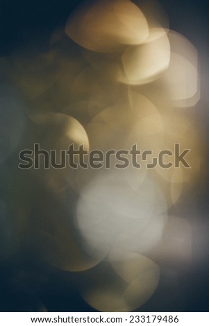 Abstract Festive background. Christmas and New Year feast bokeh background with copyspace. Vintage photography effect. Retro grainy color film look.