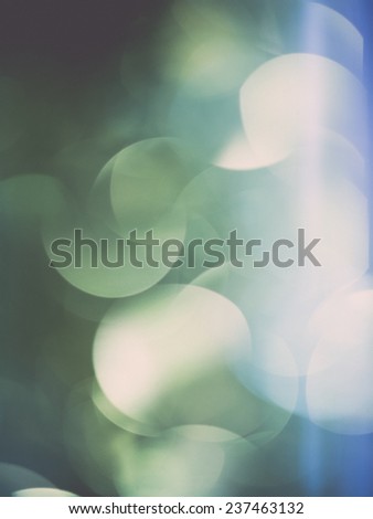 Abstract Festive background. Christmas and New Year feast bokeh background with copyspace. Holiday party background with blurry boke special magic effect. - retro, vintage style look