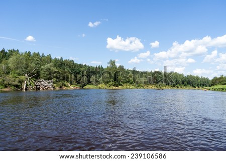 tourists enjoying water sports, kayaking in wild river - Sigulda, Latvia, 2014-07-27