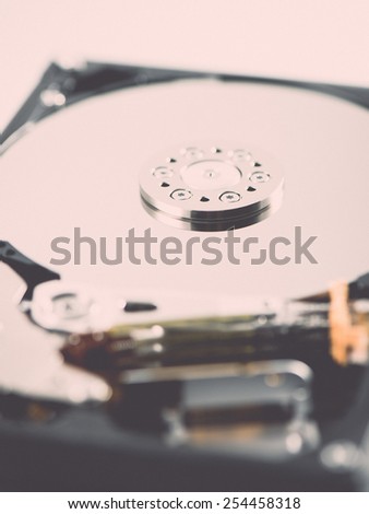 computer hard disk drive close-up shot. shallow depth of field. macro - retro vintage effect