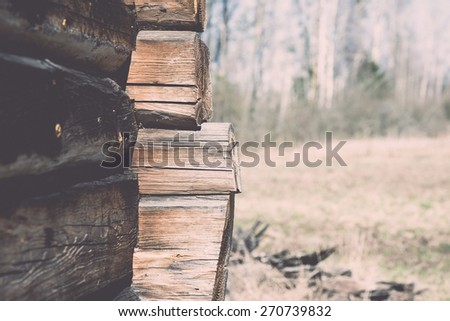 old countryside house wooden wall details and close-up - retro vintage film effect