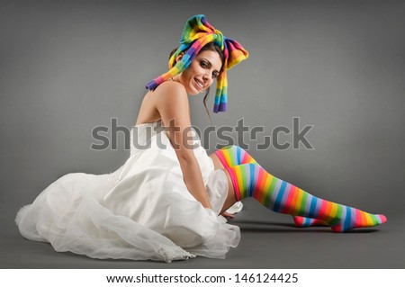 Funny bride with colorful socks and scarf