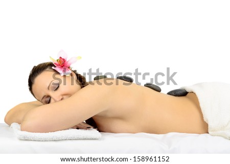 Beautiful woman in a  massage at beauty spa salon.