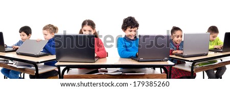 Children in the classroom with laptop computers Children in the classroom with laptop computers