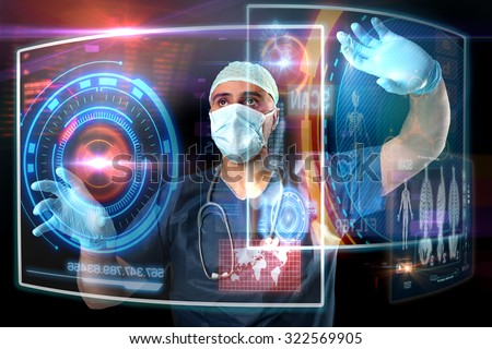 Doctor in uniform with digital  screens working