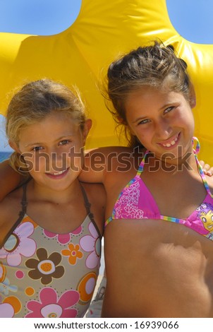 stock photo Two young girls in the beach