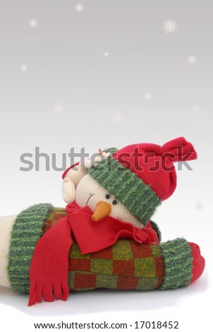 Snowman isolated against a soft gray background
