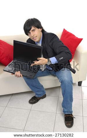 Businessman with laptop isolated in white
