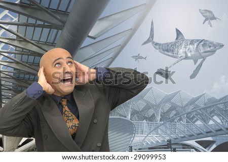 Scared businessman with big sharks all around