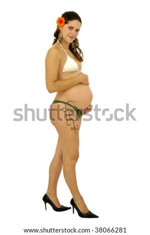 Pregnant woman with tattoo posing in 